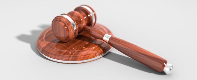 wooden gavel on a white background